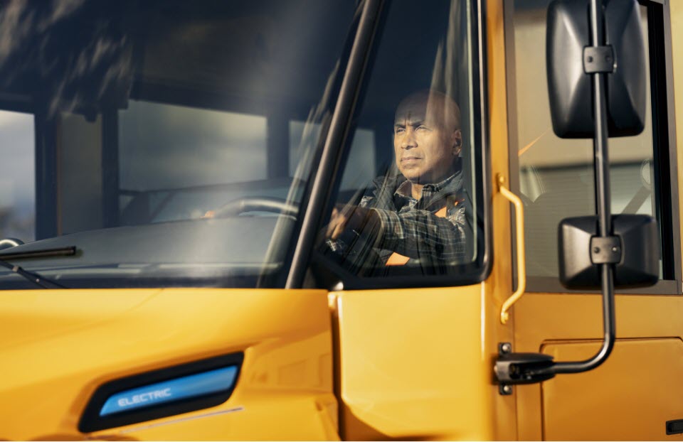 School bus driver in driver's seat