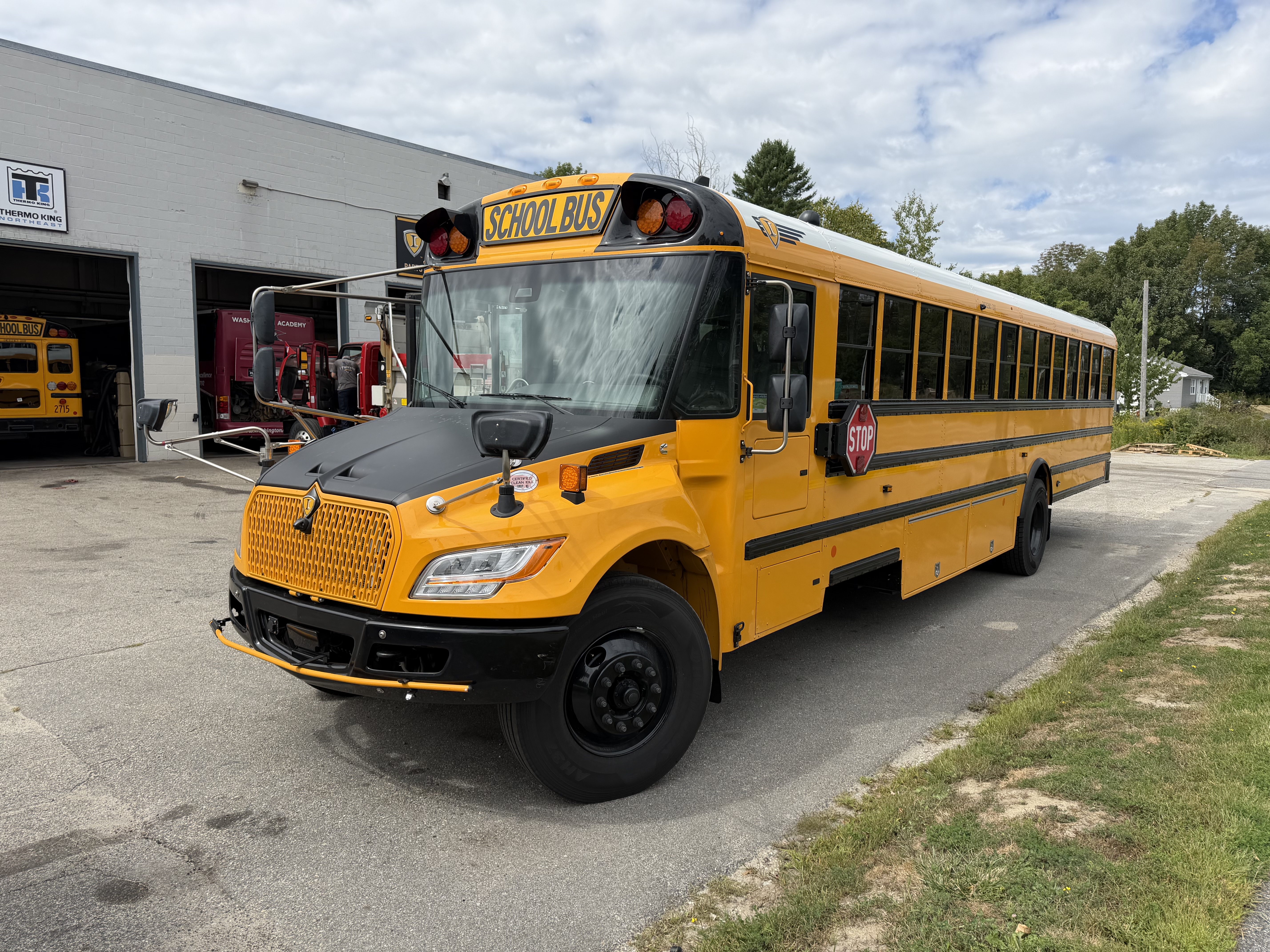 <img src="https://www.icbus.com/-/media/Project/Navistar/ICBus/ICBus/Blog/2026/school_bus_parking_lot.jpeg?h=4284&iar=0&w=5712&rev=13e479d5ac6147489589794b5136bbbc&hash=9857FCBDC3EA123A8F1717544E722546" alt="Front view of a school bus parked in a parking lot" width="5712" height="4284" />