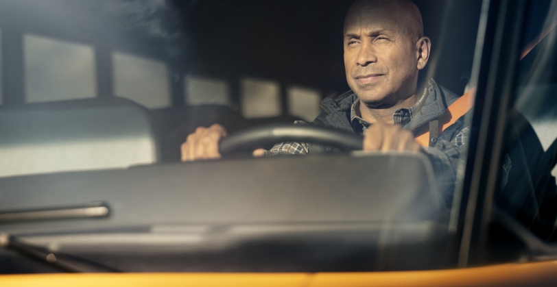 School bus driver looking out windshield