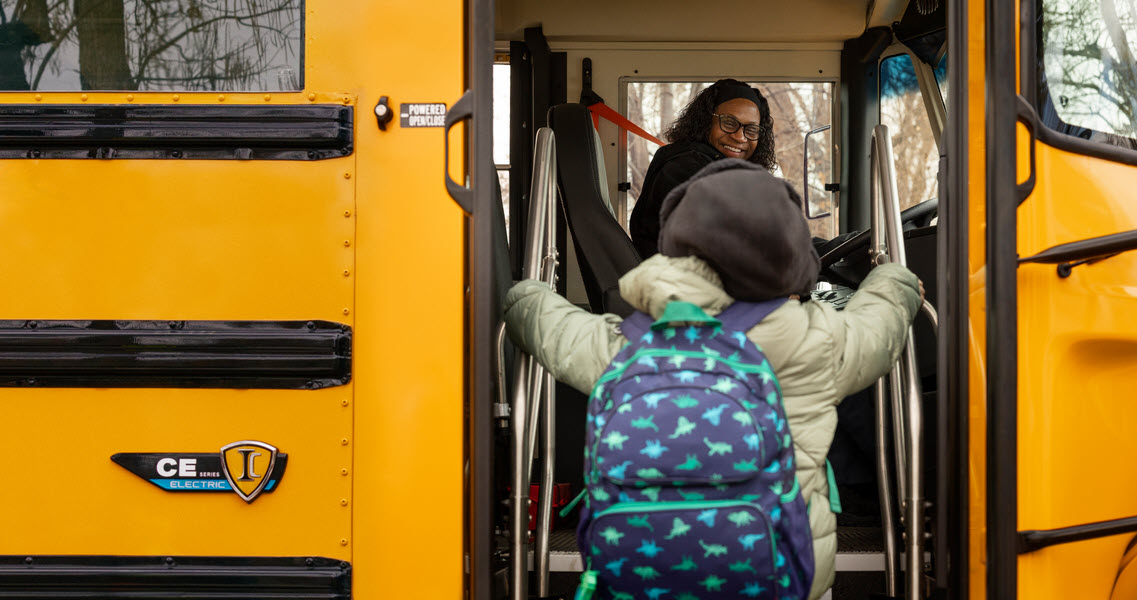 Child boarding school bus